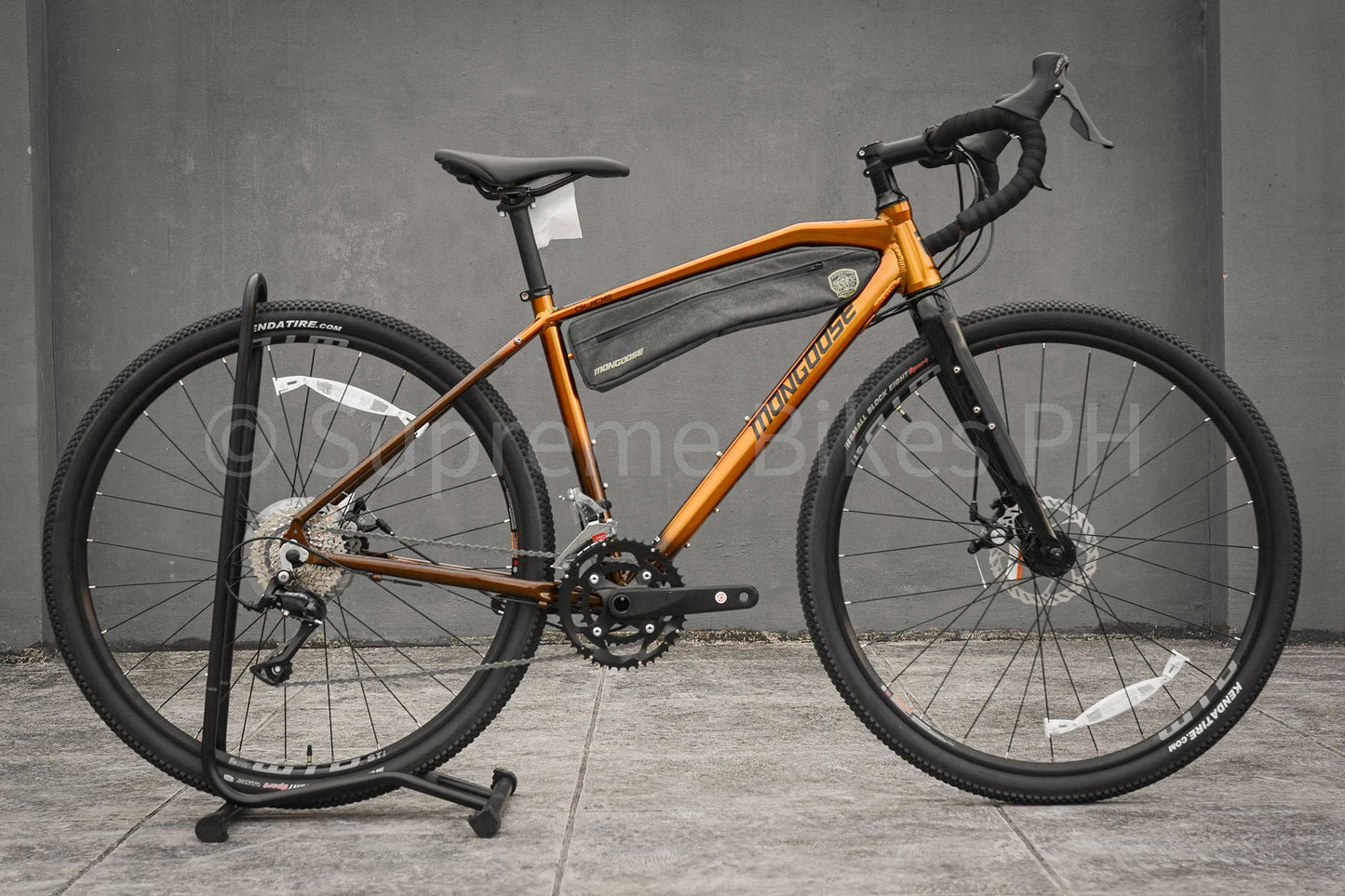 Mongoose Guide Sport Gravel Bike - Sunset Orange